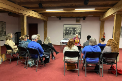 Group of people seated for a program