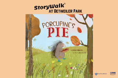 Porcupine walking through grass and trees holding a pie