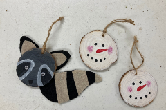 Racoon and snowman head ornaments