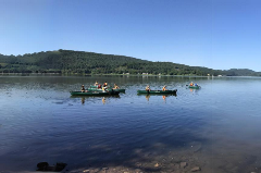 People kayaking on a river